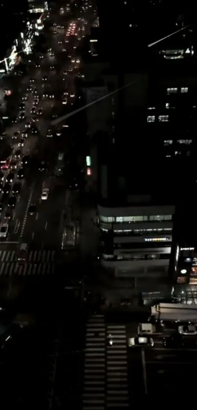 Beautiful city street view at night with bright lights and dark buildings.