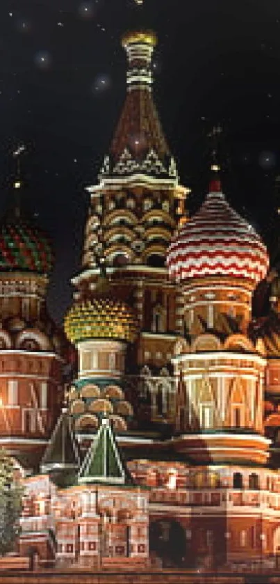 St. Basil's Cathedral illuminated at night against a dark sky.