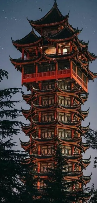 Traditional pagoda with starlit night sky backdrop.