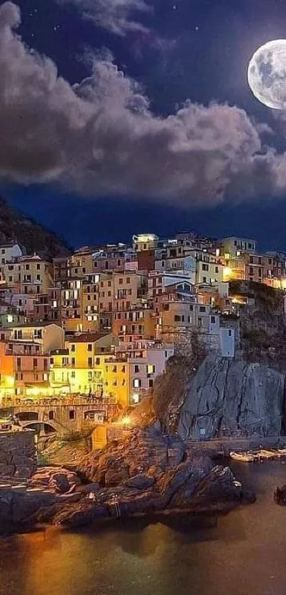 Coastal village illuminated under a full moon and night sky, ideal for phone wallpaper.