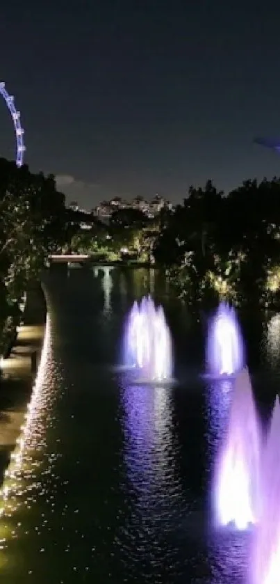 Night cityscape with illuminated fountains and greenery.