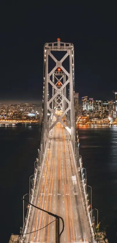 A glowing bridge at night in a cityscape view.