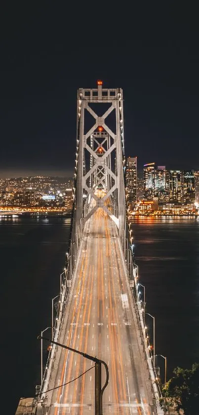 Dramatic nighttime bridge with city skyline backdrop.