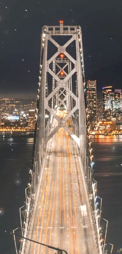 A beautifully lit bridge with city lights at night.