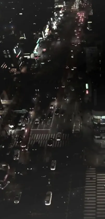 Aerial view of bustling city street at night.