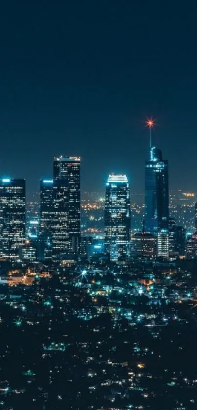 Nighttime cityscape with bright urban skyline against dark blue sky.