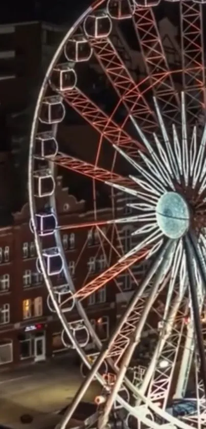 Illuminated Ferris wheel against dark urban skyline at night.