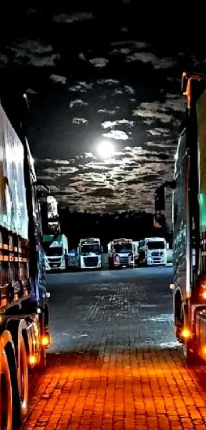 Night view of trucks parked under a full moon at a transport terminal.