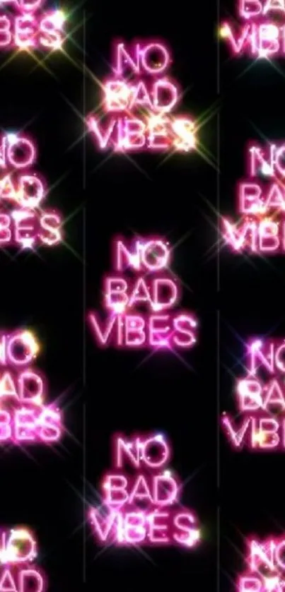 Neon 'No Bad Vibes' text on a black background.