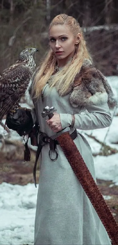 Nordic warrior with a hawk in snowy forest mobile wallpaper.