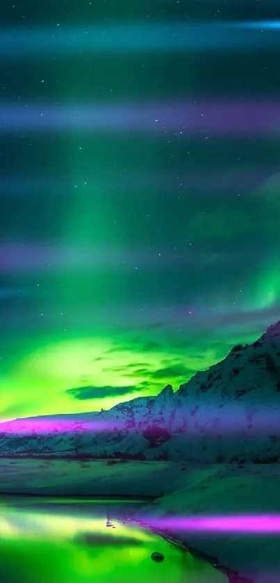 Vibrant green aurora lights over snowy mountains reflecting in a tranquil lake.