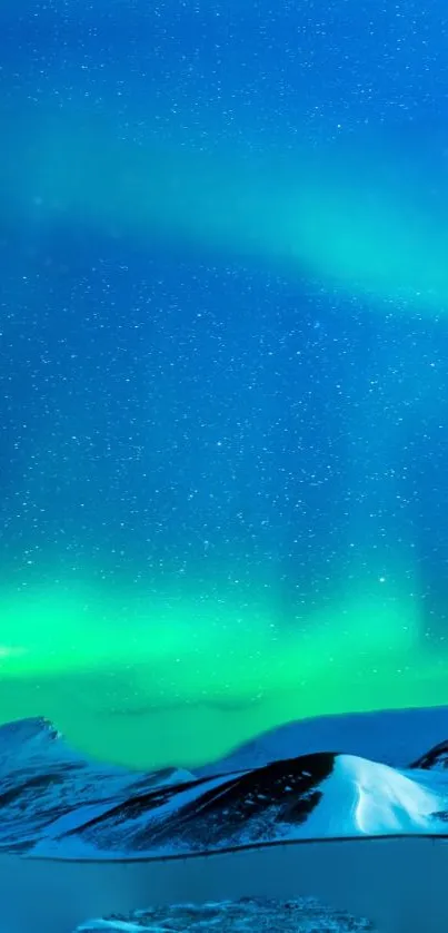 Vibrant Northern Lights illuminating snowy mountains under a starry sky.