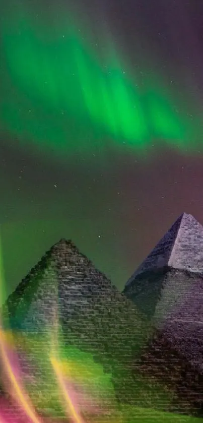 Northern Lights illuminating the pyramids under a starry night sky.