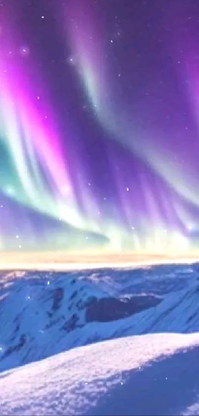 Northern Lights over snowy mountains at night