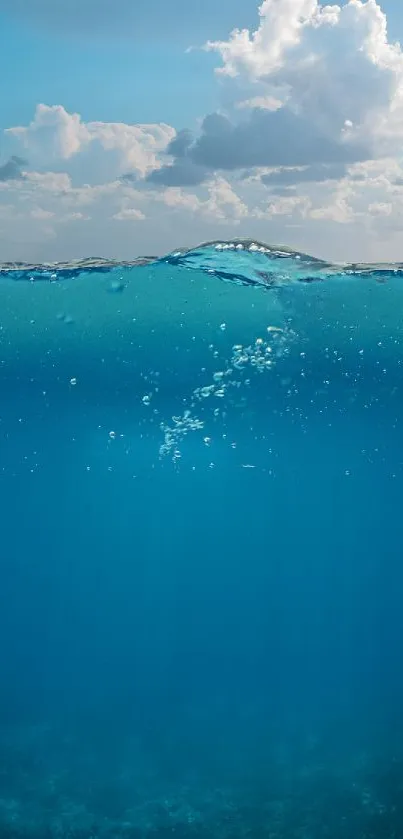 Mobile wallpaper of ocean and sky with clouds.