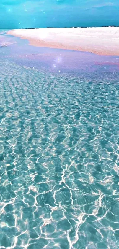 Turquoise ocean waves and sandy beach.