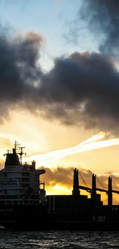 Silhouette of a ship against a vibrant ocean sunset.