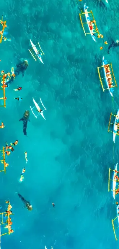 Aerial view of boats on turquoise ocean water.