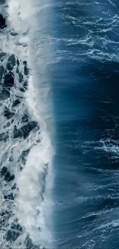 Aerial view of dynamic ocean waves, perfect for mobile wallpaper.