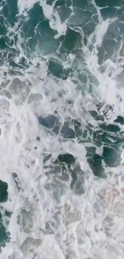 Aerial view of dynamic ocean waves, full of motion and intricate patterns.