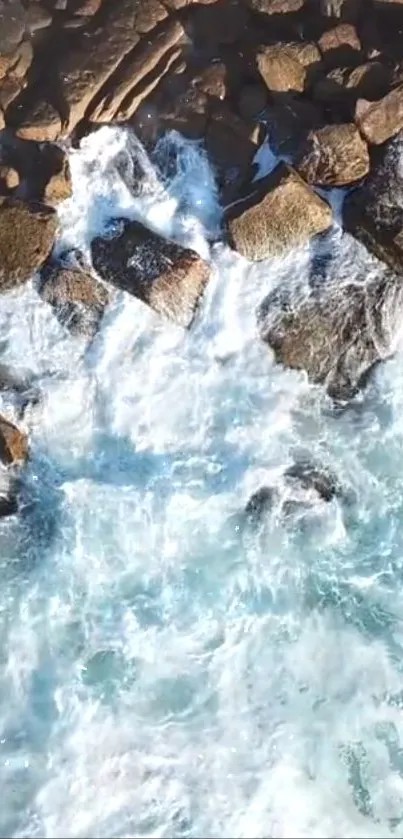 Blue ocean waves crashing on rocky shore with vivid textures.