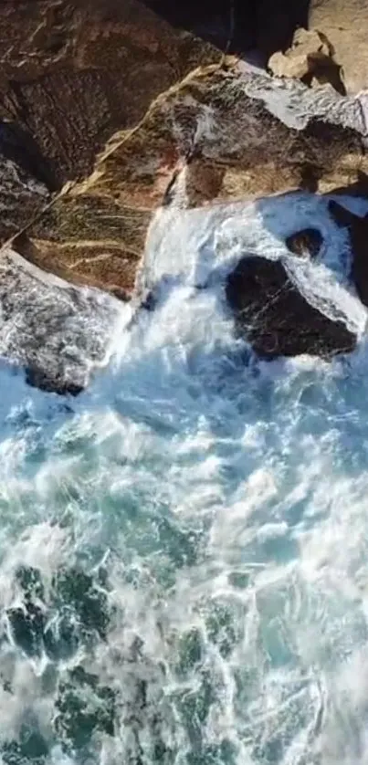 Dynamic ocean waves crashing on a rocky coast with blue waters.