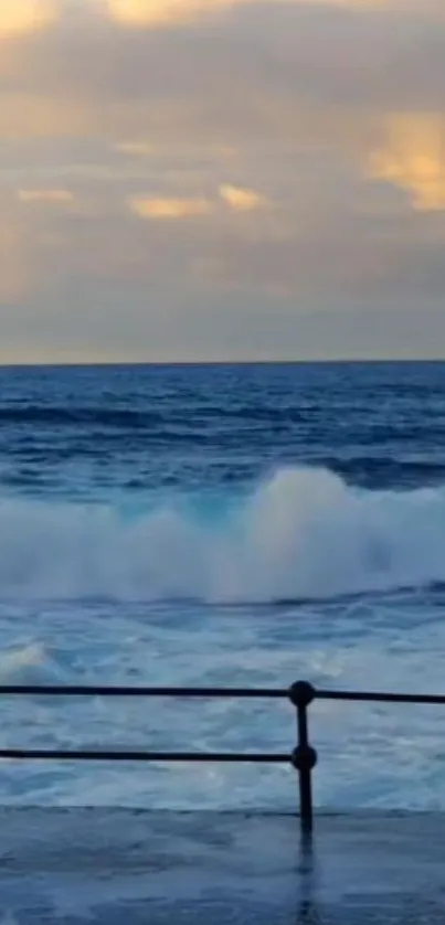 Ocean waves crashing against a sunset-lit horizon.