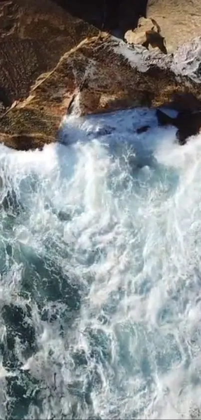 Powerful ocean waves crashing against rugged coastal rocks.