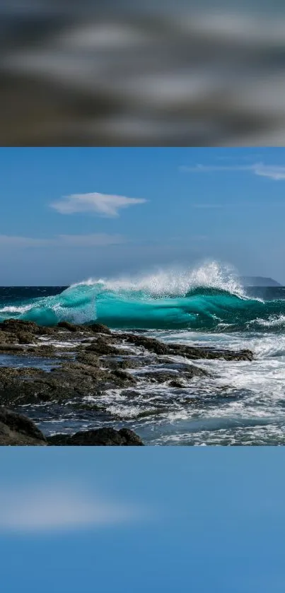 Dynamic ocean waves breaking against rocky shore under blue sky.