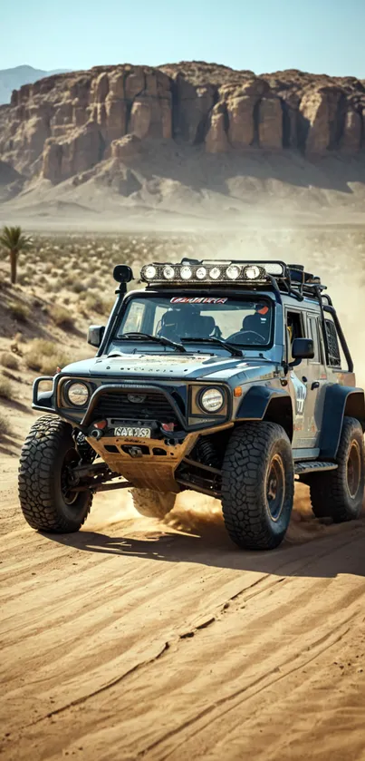 Rugged 4x4 vehicle on a dusty desert trail with mountains in the background.