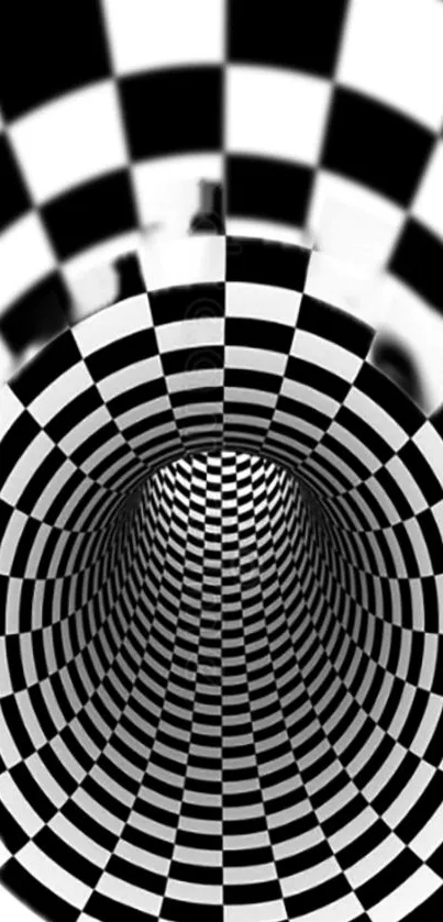 Black and white checkered tunnel creating an optical illusion effect.