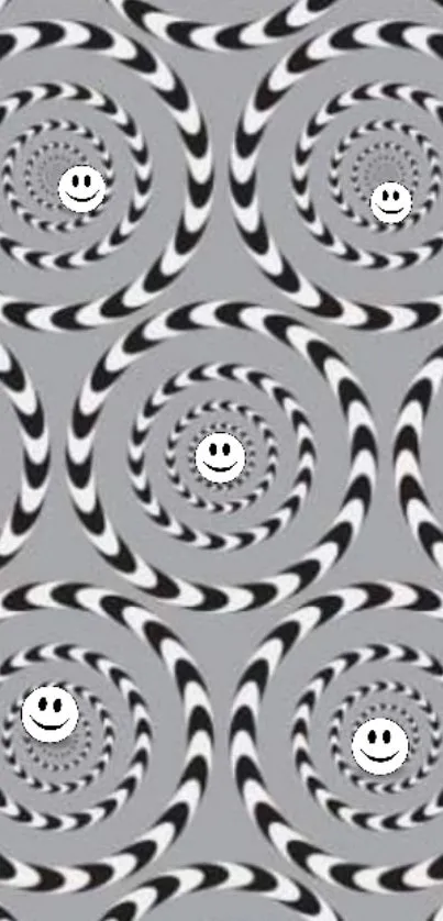 Optical illusion wallpaper with smiley spirals on a gray background.