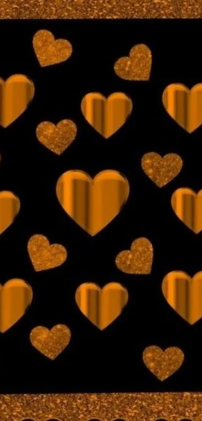 Orange heart pattern wallpaper with glitter effects on black background.