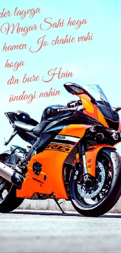 Orange sports motorcycle with an inspirational quote on a mobile wallpaper.