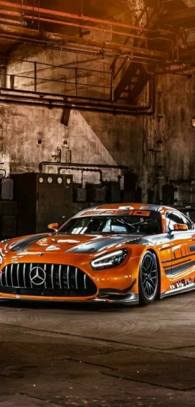 Orange sports car parked in a vintage industrial warehouse setting.