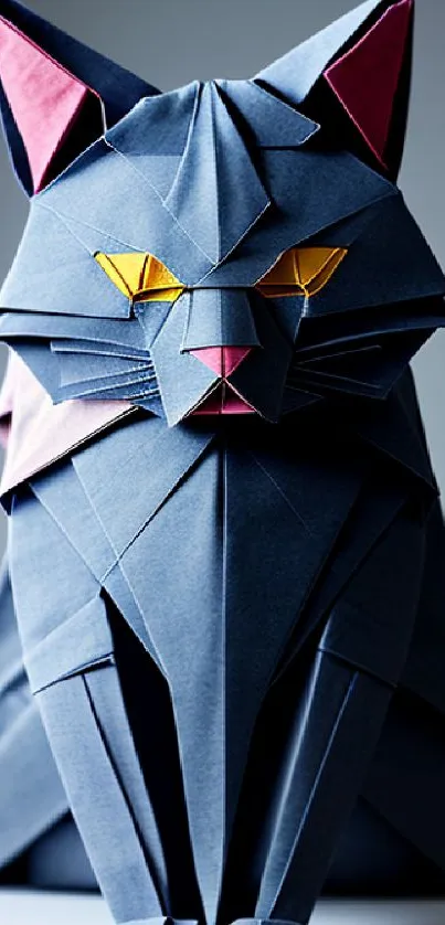 Dark blue origami cat with pink accents and yellow eyes.