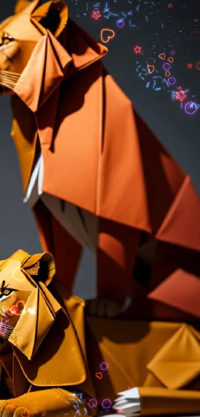 Two origami lions with intricate design in vibrant orange hues.