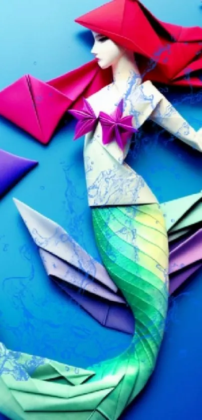 Colorful origami mermaid with geometric shapes on a blue background.