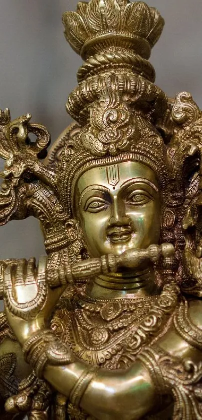 Ornate brass statue with intricate design.