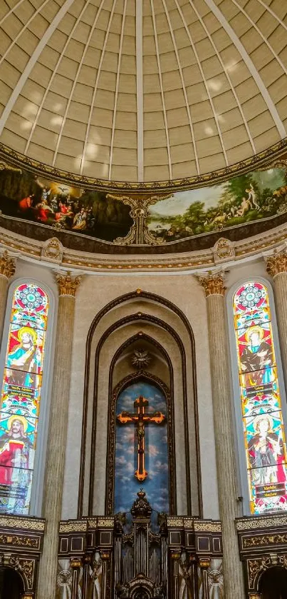 Ornate church interior with stained glass and decorative ceiling.