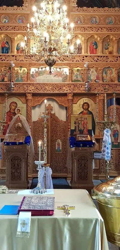 Ornate church interior featuring wooden icons and a gold chandelier.