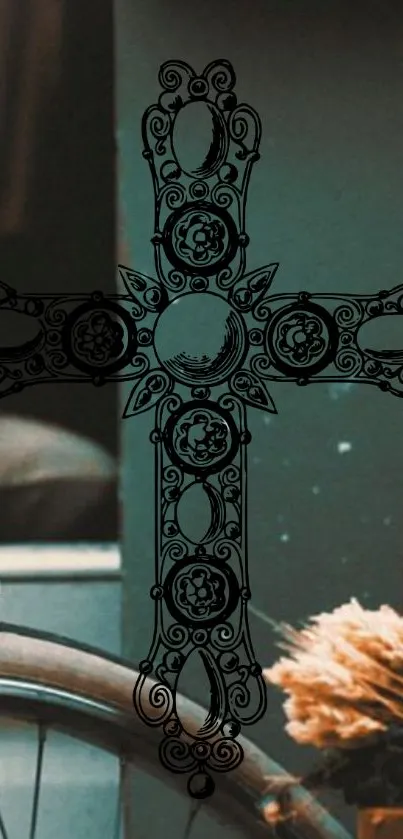 Intricate black ornate cross on teal background wallpaper.