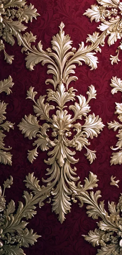 Luxurious gold pattern on deep red wallpaper.