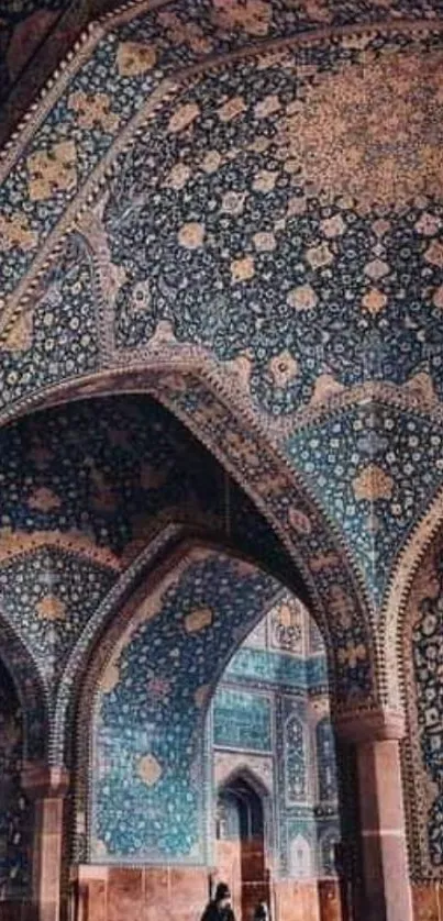 Intricate Islamic archway with blue tiles.