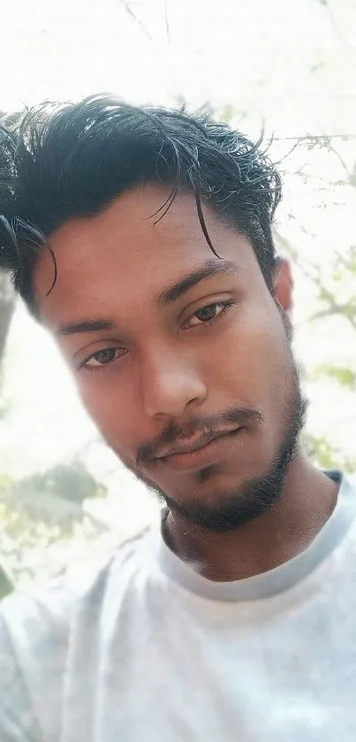 Young man in outdoor portrait with natural light.