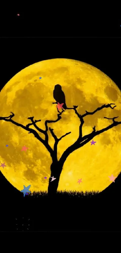 Black owl silhouette on a tree with a yellow full moon background.