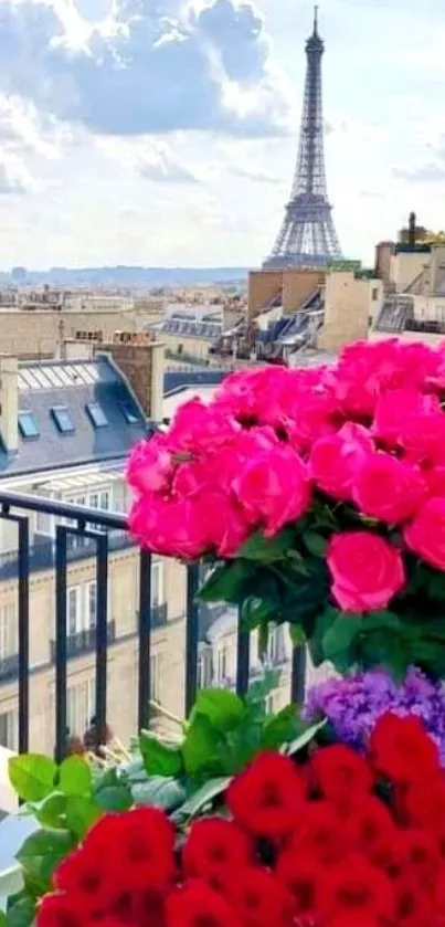 Parisian rooftop view with pink roses and Eiffel Tower in the background.