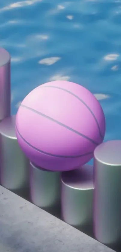 Pastel ball resting on cylinders by blue water.