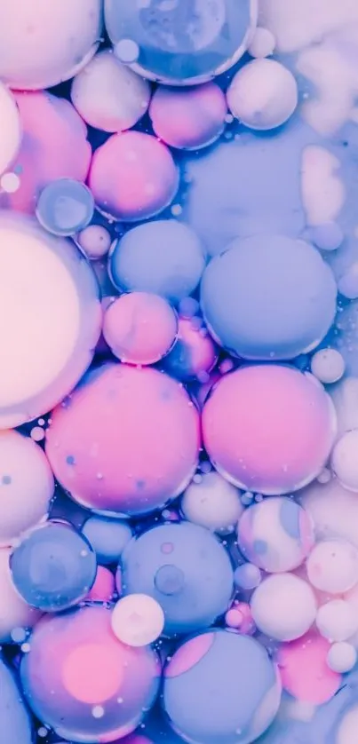 Mobile wallpaper with pastel bubbles in pink, blue, and white hues.