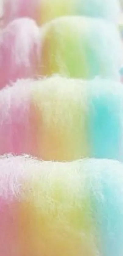 Pastel rainbow cotton candy sticks in soft hues.